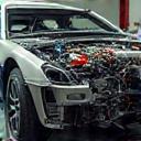 Disassembled front end of a car ready for repair